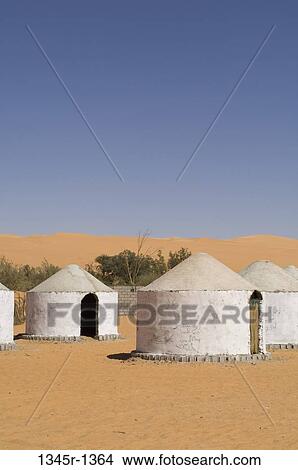 Huts in a desert, Lake Gabroun, Erg Awbari, Fezzan, Libya View Large Photo Image Picture - Huts in a desert, Lake Gabroun, Erg Awbari, Fezzan, Libya. Fotosearch