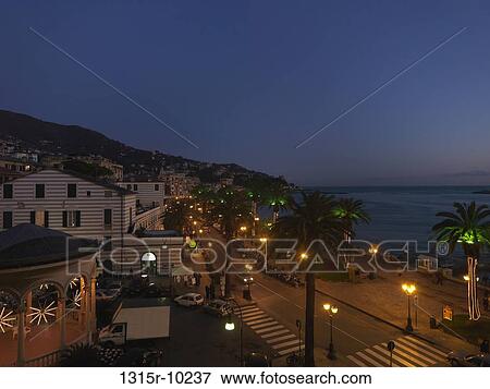 Italy, Liguria, Rapaloo, Waterfront and historic center decorated with Christmas lights View Large Photo Image Stock Photo - Italy, Liguria, Rapaloo, Waterfront and historic center decorated with Christmas lights. Fotosearch