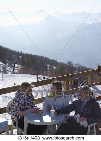 Italy, Piedmont, Bardonecchia, teenage girls and mother having lunch at outdoor cafe View Large Photo Image Stock Image - Italy, Piedmont, Bardonecchia, teenage girls and mother having lunch at outdoor cafe. Fotosearch