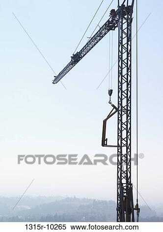 Italy, Piedmont, Building crane overlooks village, hills View Large Photo Image Stock Photography - Italy, Piedmont, Building crane overlooks village, hills. Fotosearch