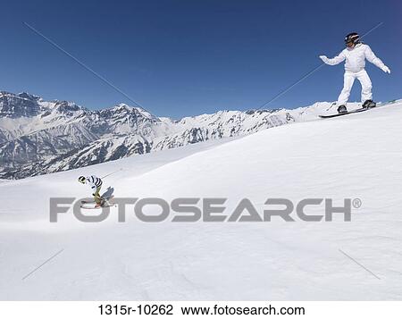 Italy, Piedmont, Jafferau, Teenage skier/snowboarder descend ridgecrest View Large Photo Image Stock Image - Italy, Piedmont, Jafferau, Teenage skier/snowboarder descend ridgecrest. Fotosearch
