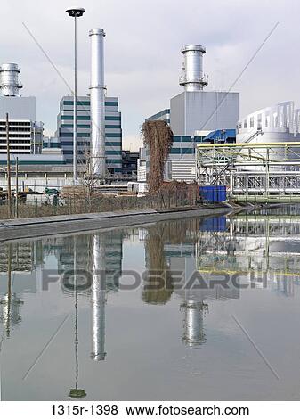Italy, Piedmont, natural gas powered electrical generating station reflected in canal View Large Photo Image Stock Photo - Italy, Piedmont, natural gas powered electrical generating station reflected in canal. Fotosearch