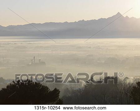 Italy, Piedmont, Turin, Fog over Po Valley and distant Mont Viso View Large Photo Image Picture - Italy, Piedmont, Turin, Fog over Po Valley and distant Mont Viso. Fotosearch