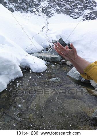 Italy, Piedmont, Woman's hands splashing water from mountain creek View Large Photo Image Stock Photograph - Italy, Piedmont, Woman's hands splashing water from mountain creek. Fotosearch