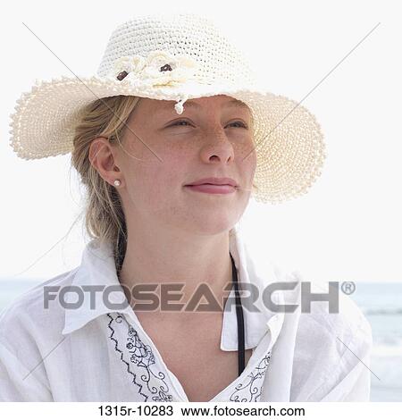 Italy, Portrait of teenage girl wearing hat View Large Photo Image Stock Image - Italy, Portrait of teenage girl wearing hat. Fotosearch
