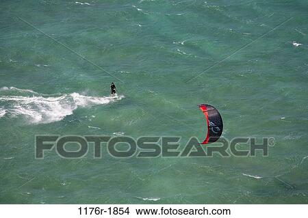 Kitesurfing on the north shore of Maui, MNR View Large Photo Image Picture - Kitesurfing on the north shore of Maui, MNR. Fotosearch