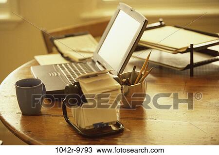 Laptop on a table View Large Photo Image Stock Image - Laptop on a table. Fotosearch