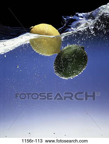 Lemons in water View Large Photo Image Stock Image - Lemons in water. Fotosearch