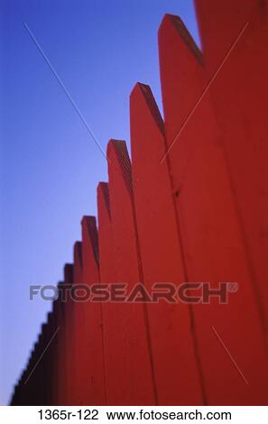 Low angle view of a red wooden fence View Large Photo Image Stock Image - Low angle view of a red wooden fence. Fotosearch