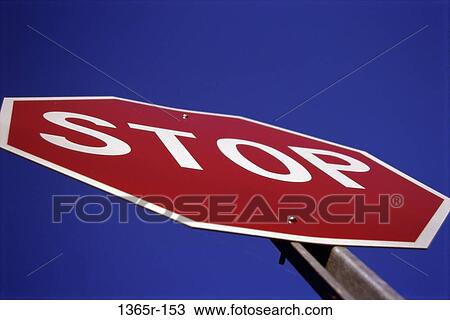 Low angle view of a stop sign View Large Photo Image Stock Image - Low angle view of a stop sign. Fotosearch