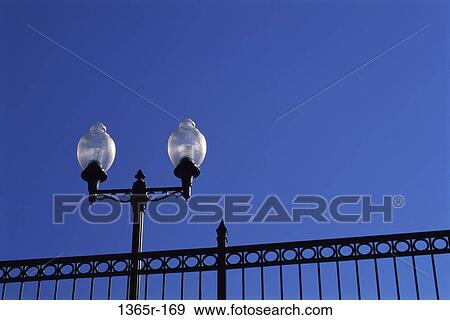 Low angle view of a street light View Large Photo Image Stock Photo - Low angle view of a street light. Fotosearch
