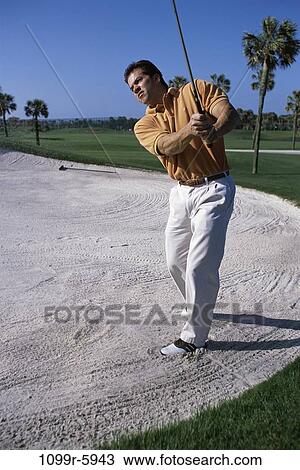 Man playing golf View Large Photo Image Stock Image - Man playing golf. Fotosearch