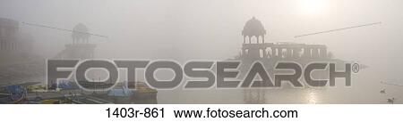 Panorama view of morning sun and fog at the 14th century man-made Gadisar Lake, Jaisalmer, Rajasthan, Indai View Large Photo Image Stock Image - Panorama view of morning sun and fog at the 14th century man-made Gadisar Lake, Jaisalmer, Rajasthan, Indai. Fotosearch