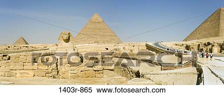 Panoramic view of The Great Sphinx and the Pyramids of Khafre and Menkaure at the Giza Plateau in Cairo, Egypt View Large Photo Image Stock Photography - Panoramic view of The Great Sphinx and the Pyramids of Khafre and Menkaure at the Giza Plateau in Cairo, Egypt. Fotosearch