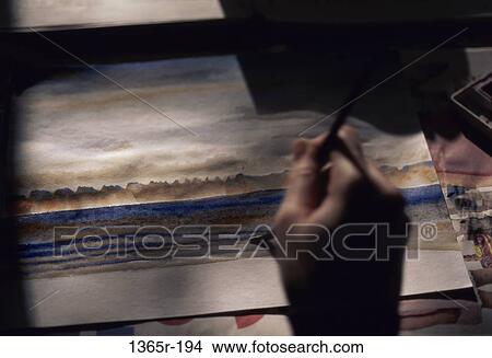 Person painting with a paintbrush View Large Photo Image Picture - Person painting with a paintbrush. Fotosearch