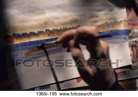 Person painting with a paintbrush View Large Photo Image Stock Photography - Person painting with a paintbrush. Fotosearch