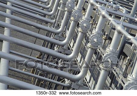 Pipes at an oil refinery View Large Photo Image Stock Image - Pipes at an oil refinery. Fotosearch