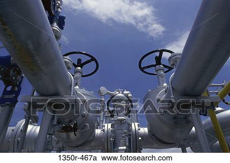 Pipes at an oil refinery View Large Photo Image Stock Image - Pipes at an oil refinery. Fotosearch