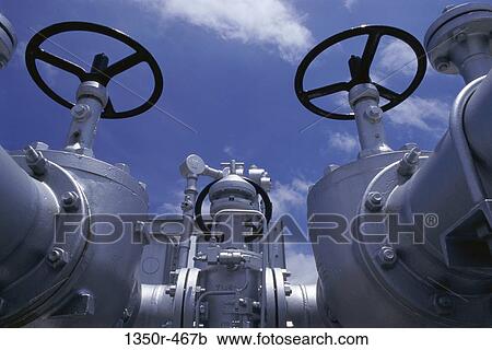 Pipes at an oil refinery View Large Photo Image Stock Image - Pipes at an oil refinery. Fotosearch