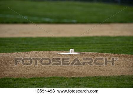 Pitcher mound with baseball View Large Photo Image Stock Image - Pitcher mound with baseball. Fotosearch
