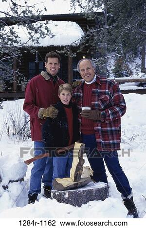 Stock Image - Portrait of a boy with his father and grandfather. Fotosearch