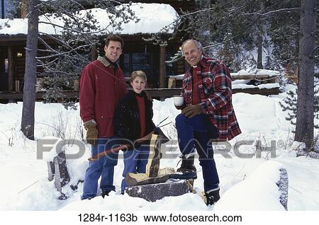 Stock Image - Portrait of a boy with his father and grandfather. Fotosearch