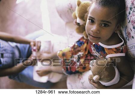 Portrait of a girl looking up View Large Photo Image Stock Image - Portrait of a girl looking up. Fotosearch
