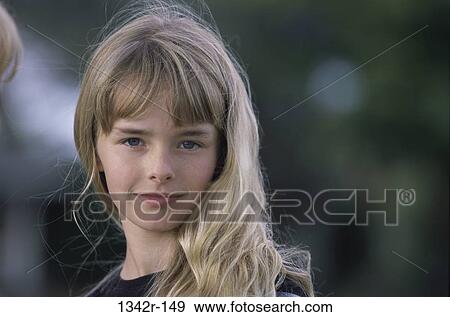 Portrait of a girl outdoors View Large Photo Image Stock Photo - Portrait of a girl outdoors. Fotosearch