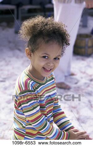 Portrait of a girl smiling View Large Photo Image Stock Image - Portrait of a girl smiling. Fotosearch