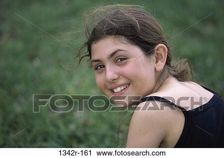 Portrait of a girl smiling View Large Photo Image Stock Image - Portrait of a girl smiling. Fotosearch