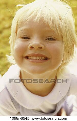 Portrait of a girl smiling View Large Photo Image Stock Photography - Portrait of a girl smiling. Fotosearch