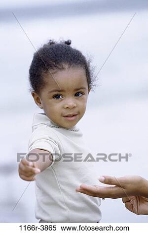 Stock Photography - Portrait of a girl smiling. Fotosearch
