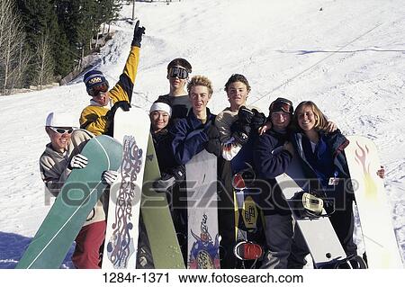 Stock Image - Portrait of a group of teenage girls and teenage boys. Fotosearch