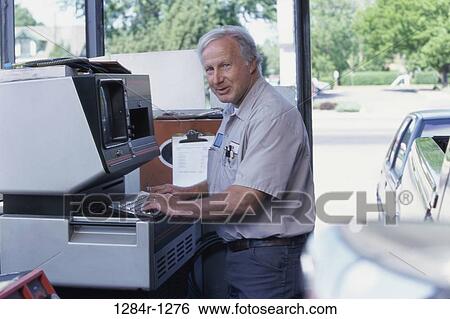 Portrait of a male machine operator View Large Photo Image Stock Photograph - Portrait of a male machine operator. Fotosearch