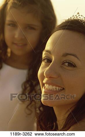 Stock Image - Portrait of a mother and her daughter. Fotosearch