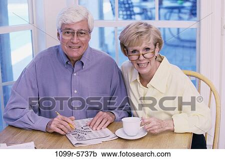 Stock Image - Portrait of a senior couple smiling. Fotosearch