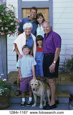 Stock Photo - Portrait of a three generation family. Fotosearch