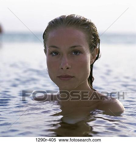 Portrait of a young woman in the water View Large Photo Image Stock Photography - Portrait of a young woman in the water. Fotosearch