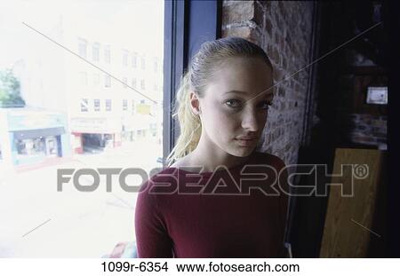 Portrait of a young woman View Large Photo Image Picture - Portrait of a young woman. Fotosearch