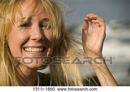 Portrait of a young woman smiling, Hawaii, USA View Large Photo Image Stock Image - Portrait of a young woman smiling, Hawaii, USA. Fotosearch