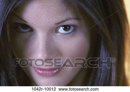 Stock Image - Portrait of a young woman. Fotosearch