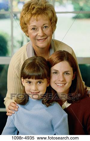 Stock Photography - Portrait of girl with her mother and grandmother. Fotosearch
