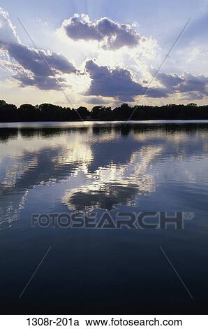 Reflections of clouds on a lake, Kansas, USA View Large Photo Image Stock Image - Reflections of clouds on a lake, Kansas, USA. Fotosearch