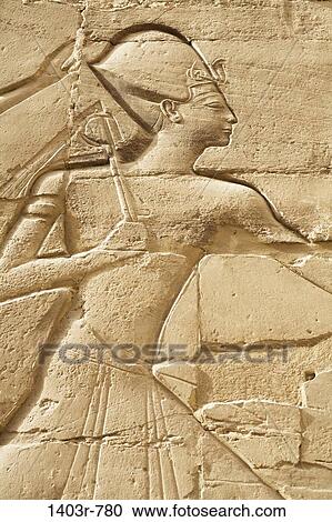 Relief carvings on the wall of the Great Hypostyle Hall at Karnak Temple, Luxor, Egypt View Large Photo Image Stock Image - Relief carvings on the wall of the Great Hypostyle Hall at Karnak Temple, Luxor, Egypt. Fotosearch