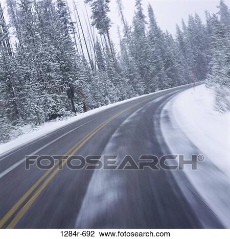 Road passing through a countryside, Wyoming, USA View Large Photo Image Stock Image - Road passing through a countryside, Wyoming, USA. Fotosearch