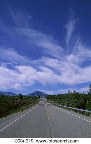 Road passing through the countryside, Glacier National Park, Montana, USA View Large Photo Image Stock Photo - Road passing through the countryside, Glacier National Park, Montana, USA. Fotosearch
