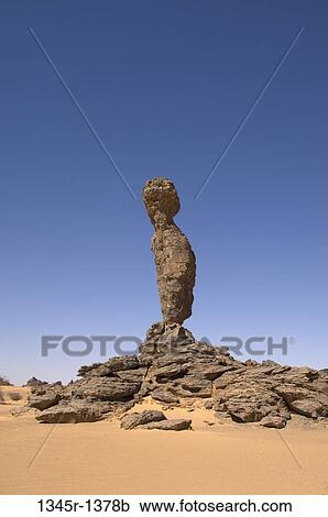Stock Image - Rock formation in a desert, Tadrart Acacus, Fezzan, Libya. Fotosearch