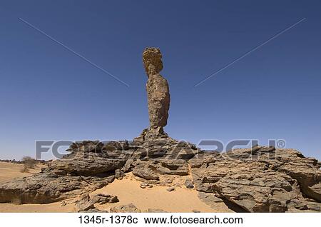 Stock Image - Rock formation in a desert, Tadrart Acacus, Fezzan, Libya. Fotosearch