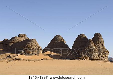 Stock Photo - Rock formations in a desert, Tadrart Acacus, Fezzan, Libya. Fotosearch