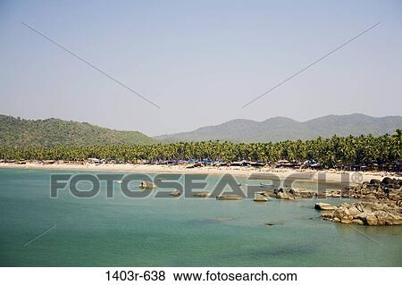 Rocks on the beach, Palolem Beach, Goa, India View Large Photo Image Stock Photo - Rocks on the beach, Palolem Beach, Goa, India. Fotosearch